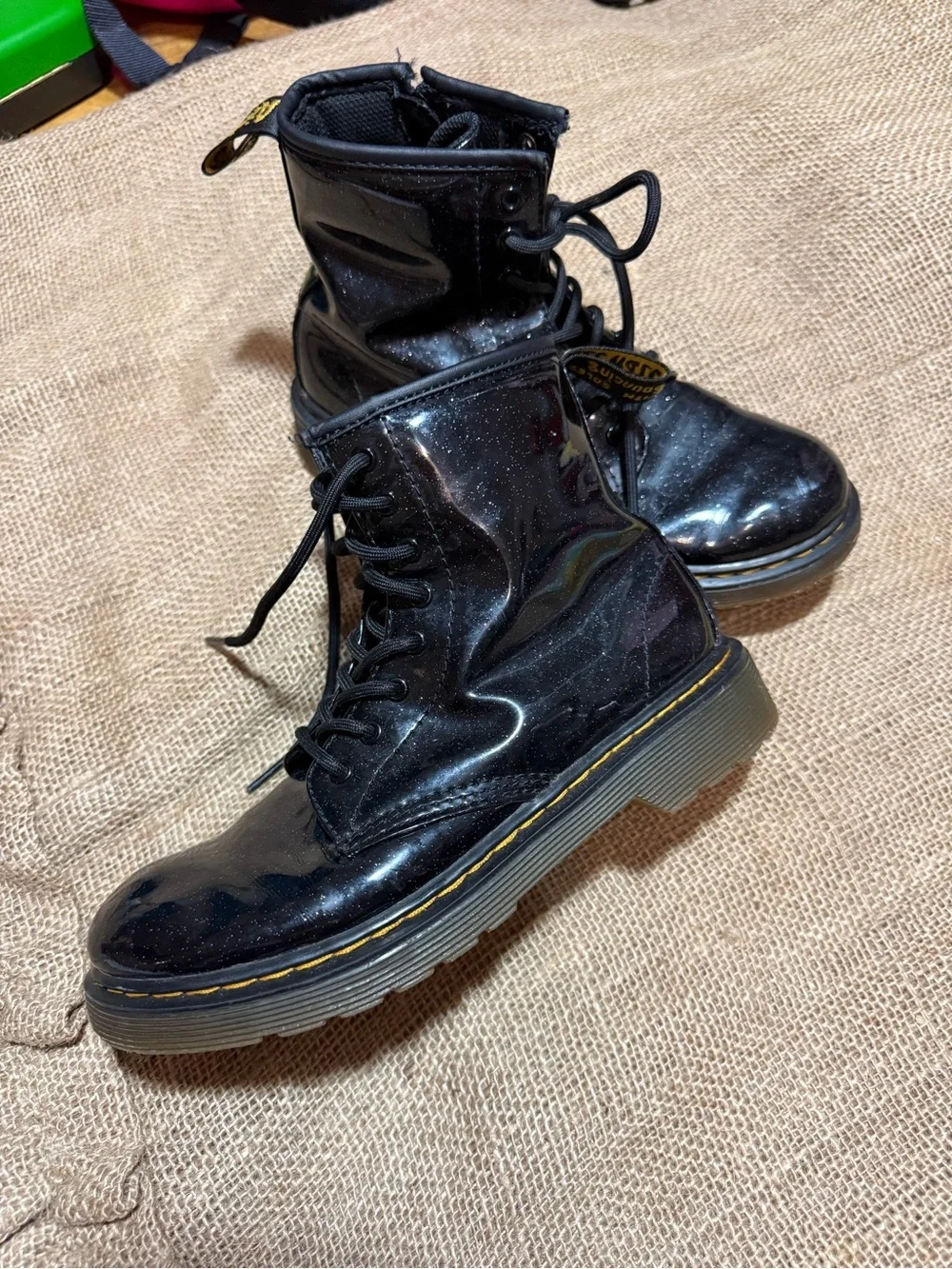 Dr. Martens 1460 Junior Glitter Black Patent Leather Boots with Yellow Stitching